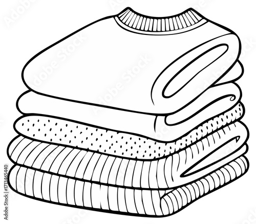Stack of neatly folded sweaters with different textures and patterns