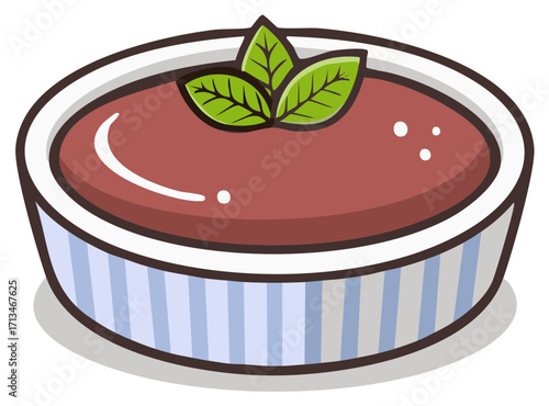 Delicious chocolate dessert in a striped ramekin adorned with fresh green mint leaves