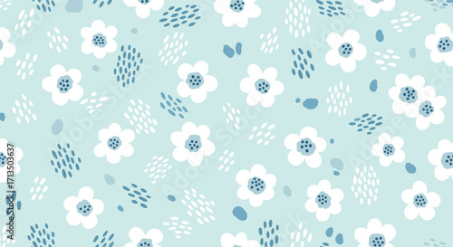 A seamless pattern of cute blue and white abstract floral elements and small dots scattered on a pale aqua background.