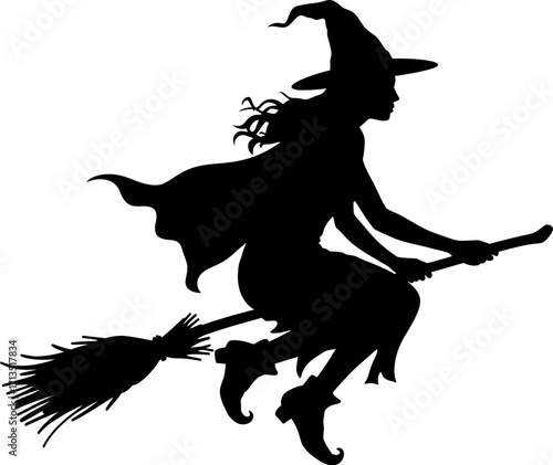 Black silhouette of a witch flying on a broomstick