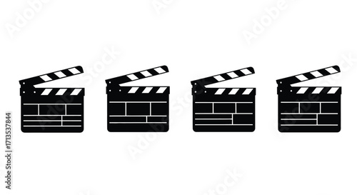 Four black film clapperboards lined up ready for action in the entertainment industry vector