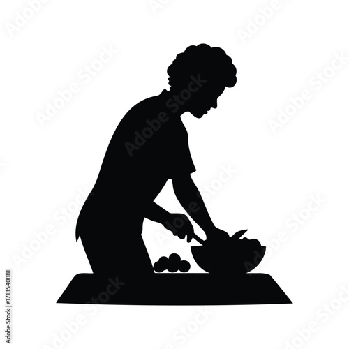 A dark silhouette of a person cooking or preparing food in a kitchen, chopping vegetables silhouette vector illustration
