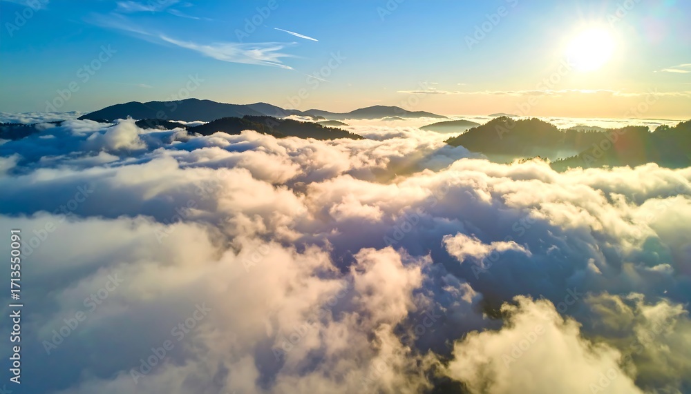 Fototapeta premium High-altitude sunrise over clouds