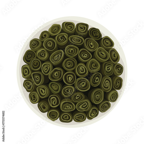 Top-Down View of a Plate Filled with Delicious Green Rolls, a Culinary Delight