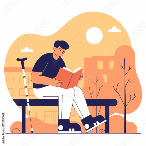 Young man reading a book while sitting on a park bench with crutches  