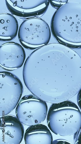 Cosmetic serum bubbles glide gracefully in a mesmerizing 3D motion, their iridescent glow and fluid dance captured in high detail, perfect for a sleek ad campaign promoting luxurious skincare products