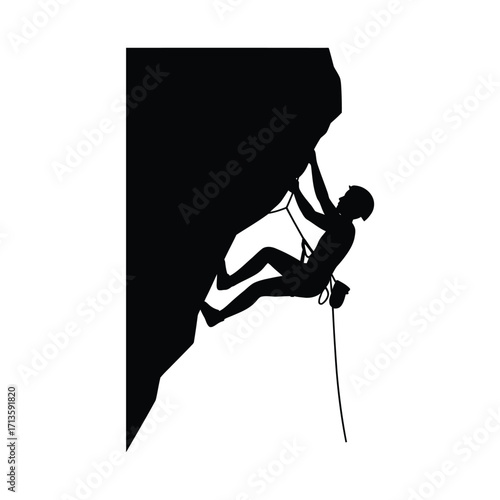 Silhouette of a rock climber scaling a steep cliff face