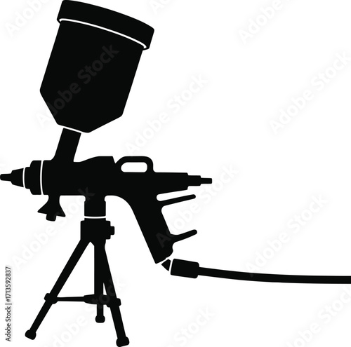 Black spray gun on tripod paint sprayer tool