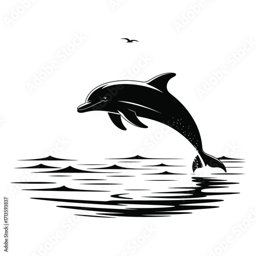 Silhouette of a dolphin leaping from wavy ocean water