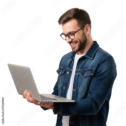 Wallpaper Mural Smiling man wearing glasses and a denim jacket holds and looks at a modern laptop computer isolated on transparent background Torontodigital.ca