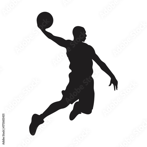 Silhouette of a basketball player in mid air during a jump shot
