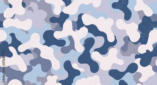 A captivating winter camouflage pattern featuring irregular shapes in shades of blue white and grey.