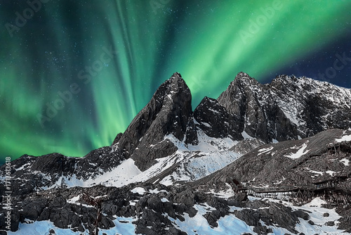 night view of snowy mountain range and milky way. starry night sky with stars and moon. beautiful landscape with snowy mountain peaks in winter night.