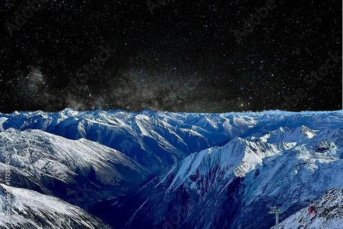 night view of snowy mountain range and milky way. starry night sky with stars and moon. beautiful landscape with snowy mountain peaks in winter night.