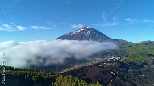 Volcanic peak above clouds
