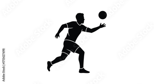 Silhouette of a man playing with a ball in motion