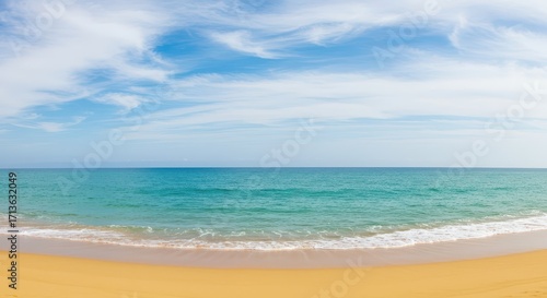 Wallpaper Mural Tranquil ocean vista with soft, pale sand beach and a clear blue sky, featuring gentle waves lapping against the shore. Torontodigital.ca