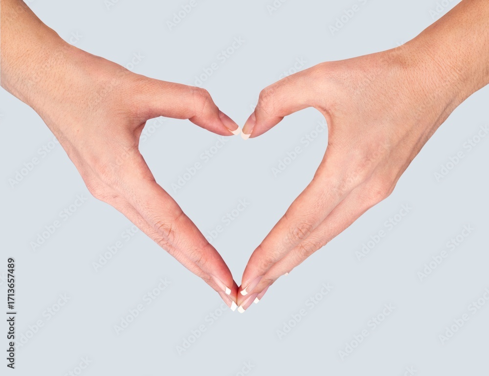 Obraz premium Hands of person hold heart sign, symbol of love