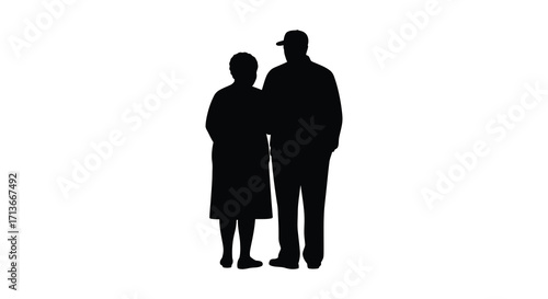 Silhouettes of an elderly couple standing close together in darkness