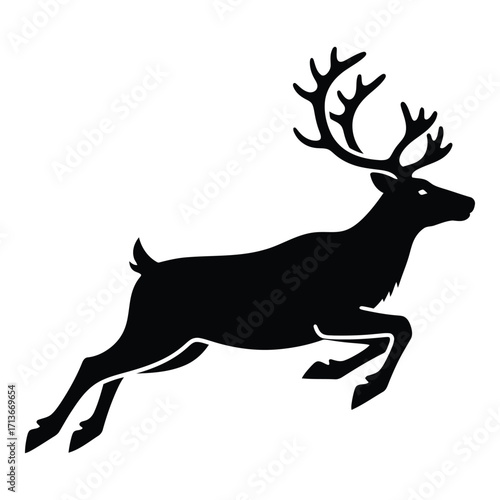 Majestic silhouette of a reindeer in full gallop antlers held high
