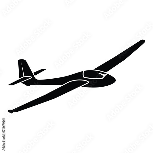 Sleek silhouette of a glider aircraft soaring through the sky