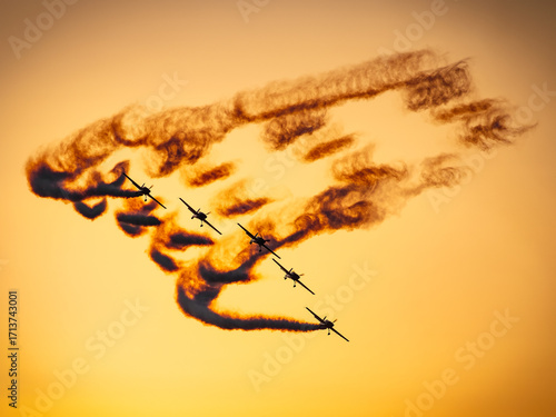 Wallpaper Mural Airshow performance in the warm light of the sunset made by skillful pilots on the skies of Bucharest Torontodigital.ca