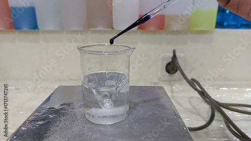 Blue Liquid Color Change in Laboratory Beaker Experiment