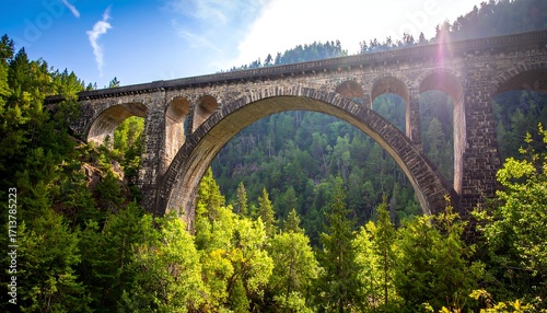 Stone arch bridge over valley