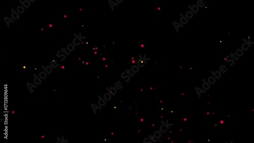 Red and Yellow Particles Floating on Black Background