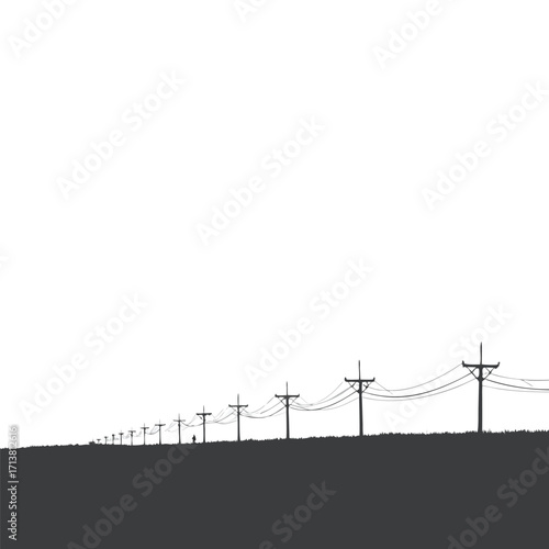 Silhouette of power lines stretching across a grassy field