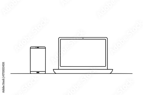 Modern technology devices including a sleek laptop and a smartphone on a clean surface