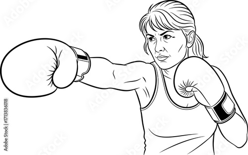 Determined woman in boxing gloves throws a powerful punch, showcasing strength and focus