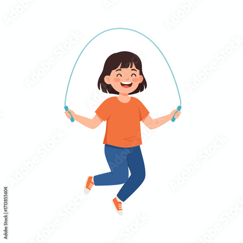 Happy little girl jumping with a skipping rope.