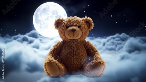Teddy bear sitting on clouds at night