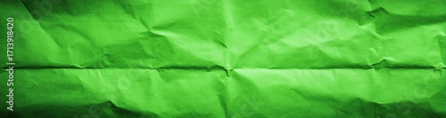 Vibrant green crumpled paper texture