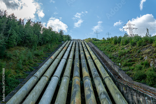 Aerial view of the Hohenwarte Dam (Hohenwarte Reservoir) and the associated pumped storage facility in Thuringia, Germany. The curved concrete gravity dam rises about 75 meters.