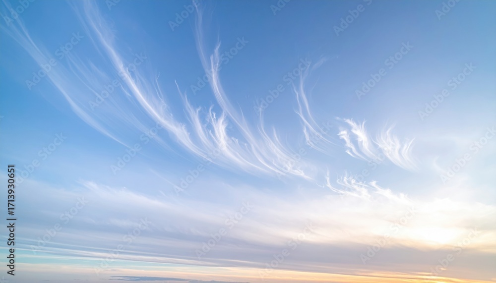 Obraz premium Pale cirrostratus with faint sundogs minimalist sky generous top copy representing halo optics suitable for weather education astronomy and clean design