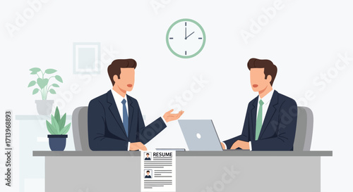 Business Meeting with Two Professionals Discussing a Resume.