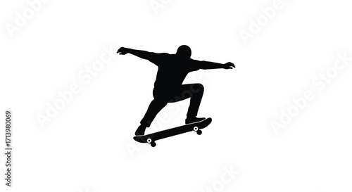 Silhouette of a skateboarder in action against a plain white background