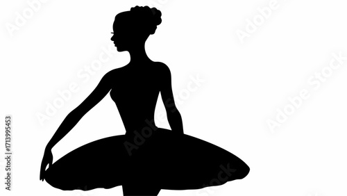 Silhouette of a ballerina in a tutu with her hair up in a bun posing gracefully against white background