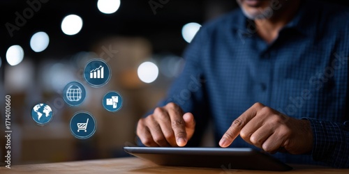 A man engaged with a tablet displaying vibrant icons representing technology communication and information exchange in a modern digital environment