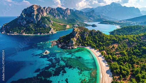 Aerial View of Turquoise Water and Green Trees on a Mountainous Coastline Under a Cloudy Sky in Summer