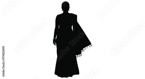 Silhouette of a woman standing in traditional sari attire against white