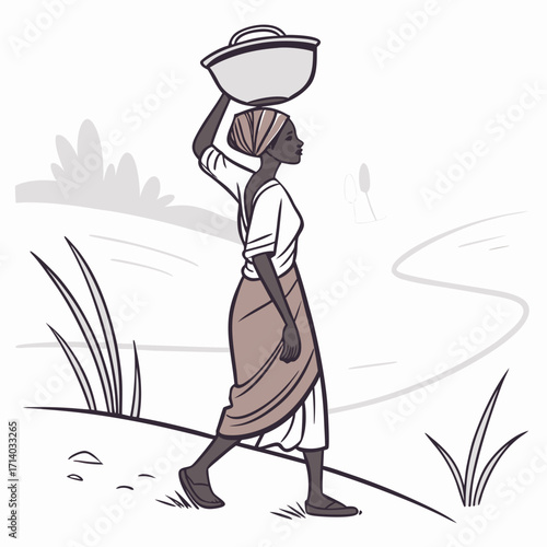 Billede på lærred African woman walking with a basket of water on her head in a rural landscape