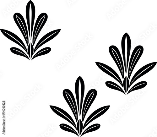 Vector art of three stylized black leaf motifs