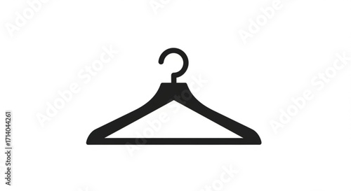 Simple black clothes hanger, a closet essential for organizing and preserving garments in a neat and tidy manner