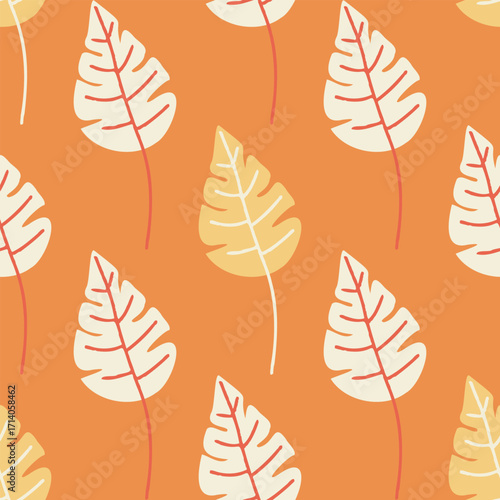 Bright seamless leaf pattern on orange background