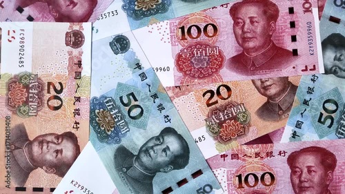 Chinese paper money, yuans in various denominations. China money as a business background for your design