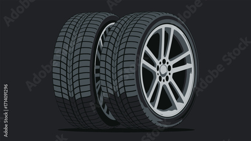 Three tires stacked against a dark gray colored background