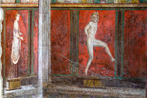 Ruins of Pompeii, Italy. Decoration detail. Fresco painting on the wall of Villa of the Mysteries.